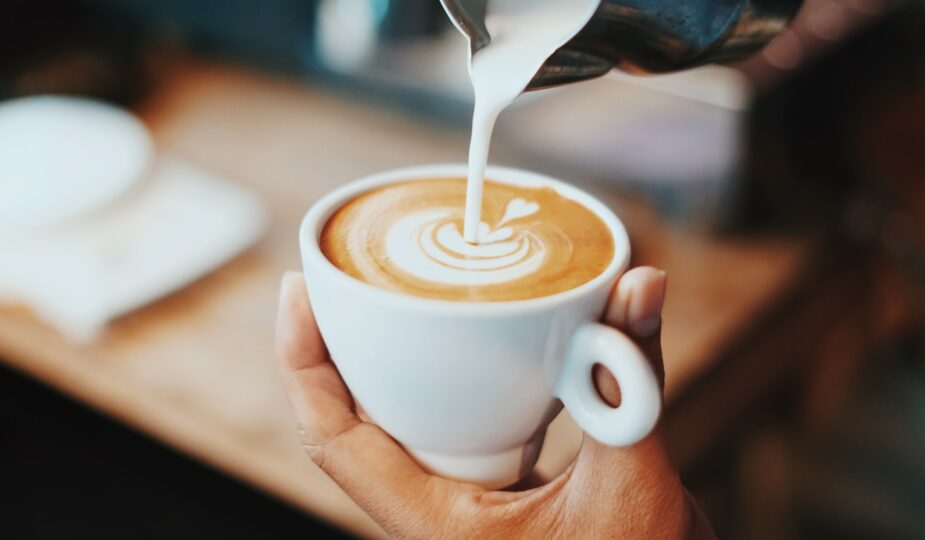 person making latte art