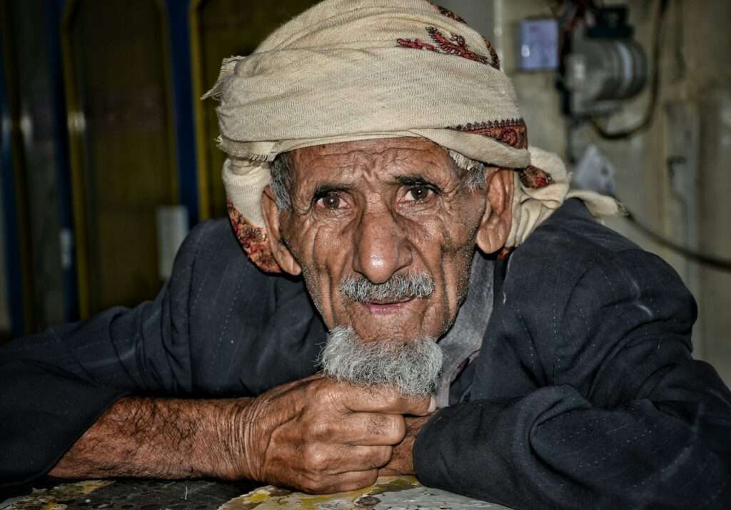 Characteristics of Yemeni Coffee an old man with a white beard and a white turban