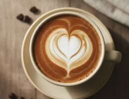Latte with a poured heart latte art design