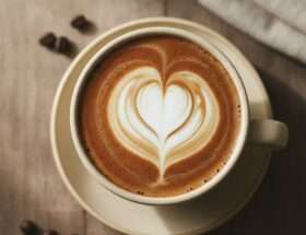 Latte with a poured heart latte art design